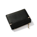 Short black ladies wallet with zipper, open to show multiple card slots, bill holder, and change compartment.