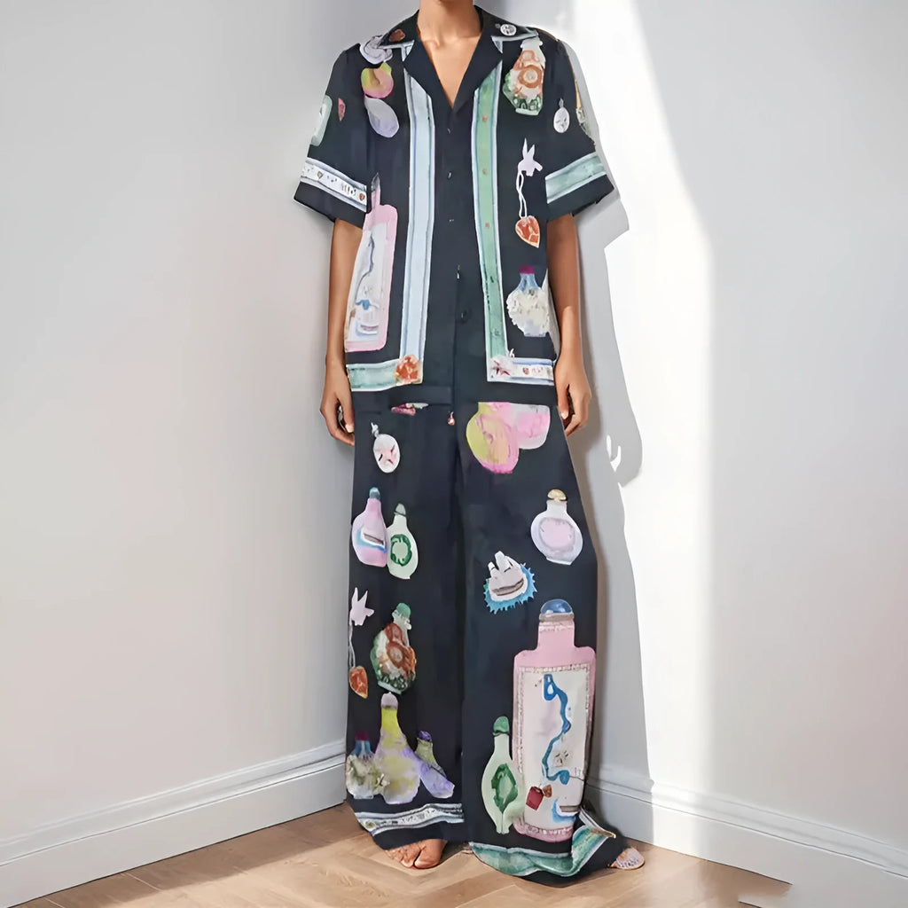Black women's cardigan and trouser set with cartoon animation pattern