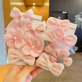 Fabric hair bow set for children with bow flower pattern in multiple colours