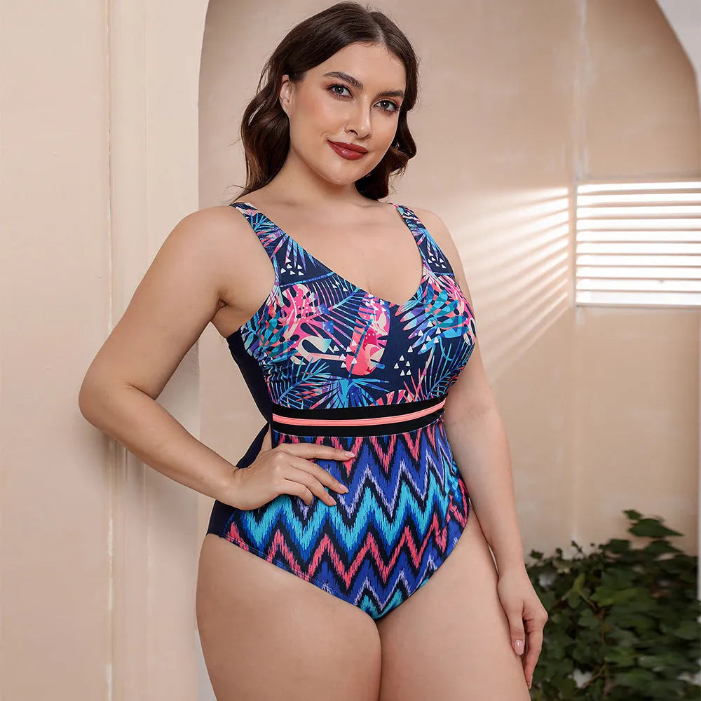 Blue printed one-piece swimsuit with spaghetti straps and a striped vest design for women's swimming.