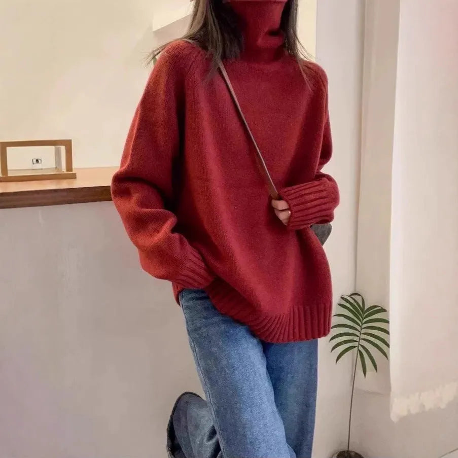 Women's loose fit turtleneck sweater with thick curling pile collar in camel colour