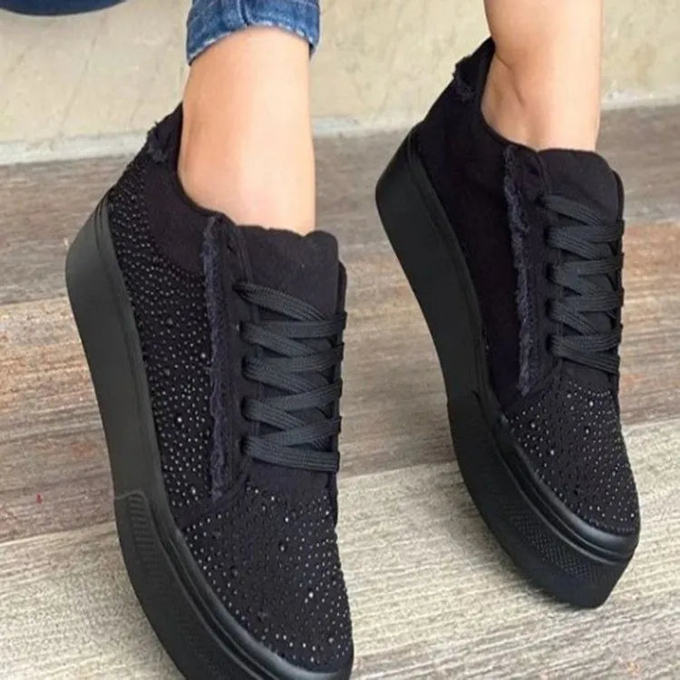Plus size women's black casual shoes with rhinestone detail, thick rubber sole, and lace-up closure