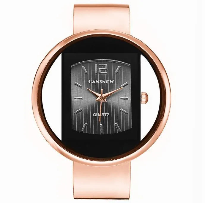 Women's adjustable cuff bracelet watch with 40mm dial, steel band, and choice of gold or silver finish