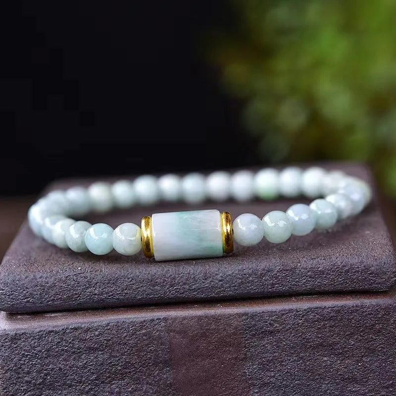 Natural Myanmar jade round bead bracelet with emerald green colour geometric stones
