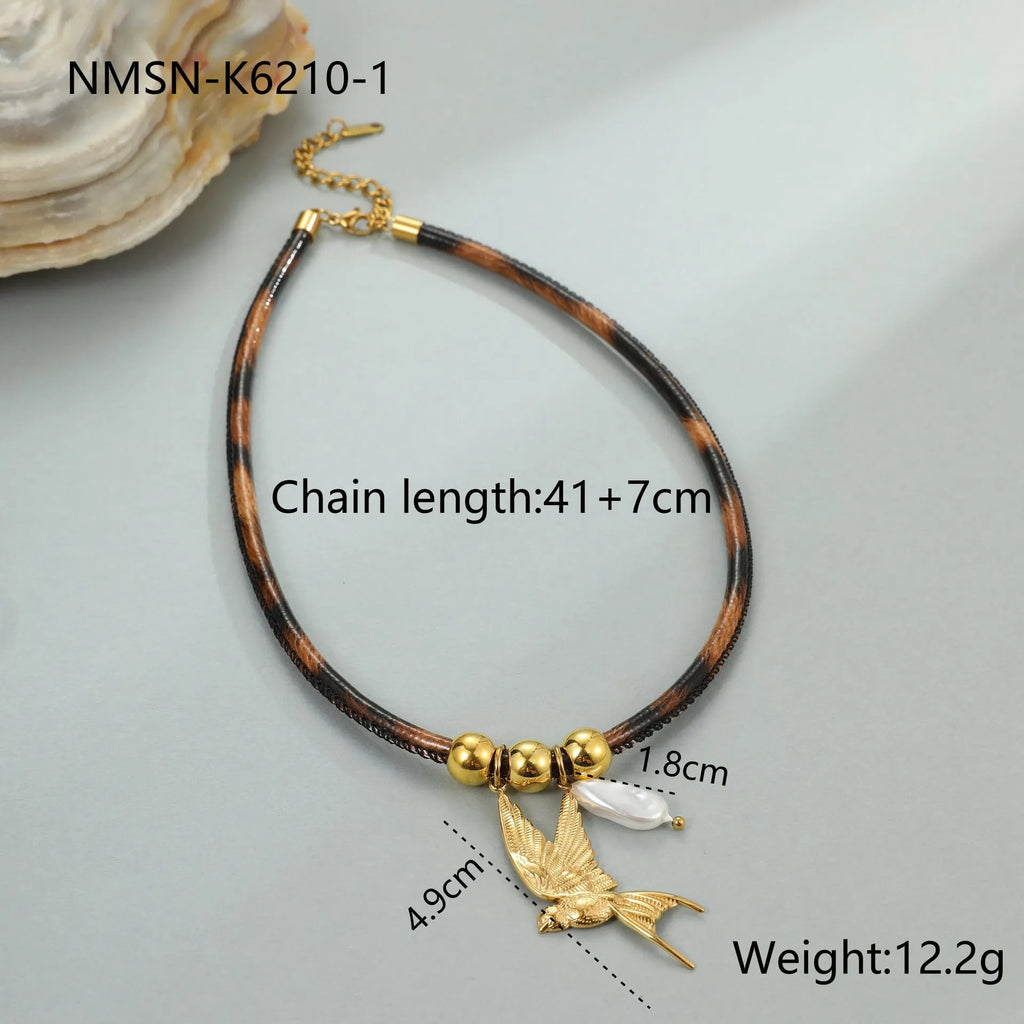 Women's stainless steel leopard pendant necklace with geometric design and gold-plated finish on adjustable chain