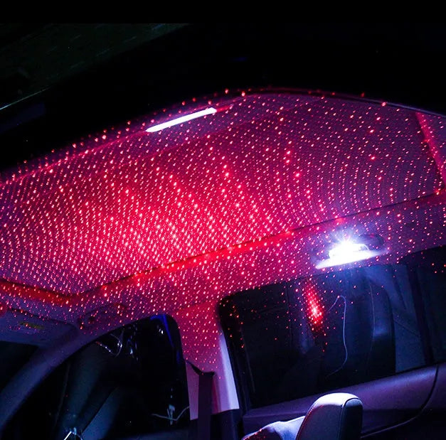 Car star ceiling light with aluminium housing, USB cable, and remote control installed in armrest box