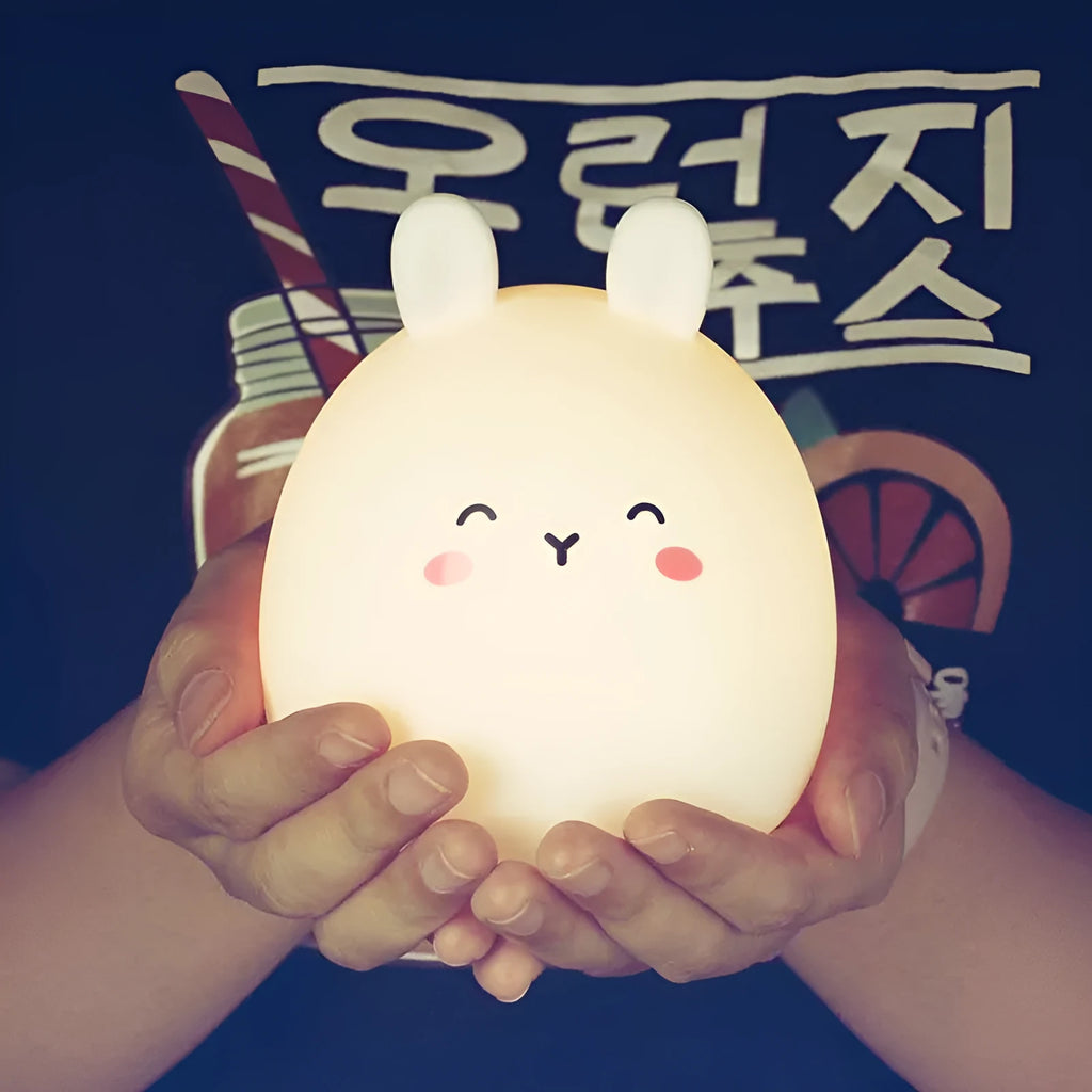 Cartoon rabbit silicone night light with colour-changing LED, 102mm by 110mm, USB rechargeable
