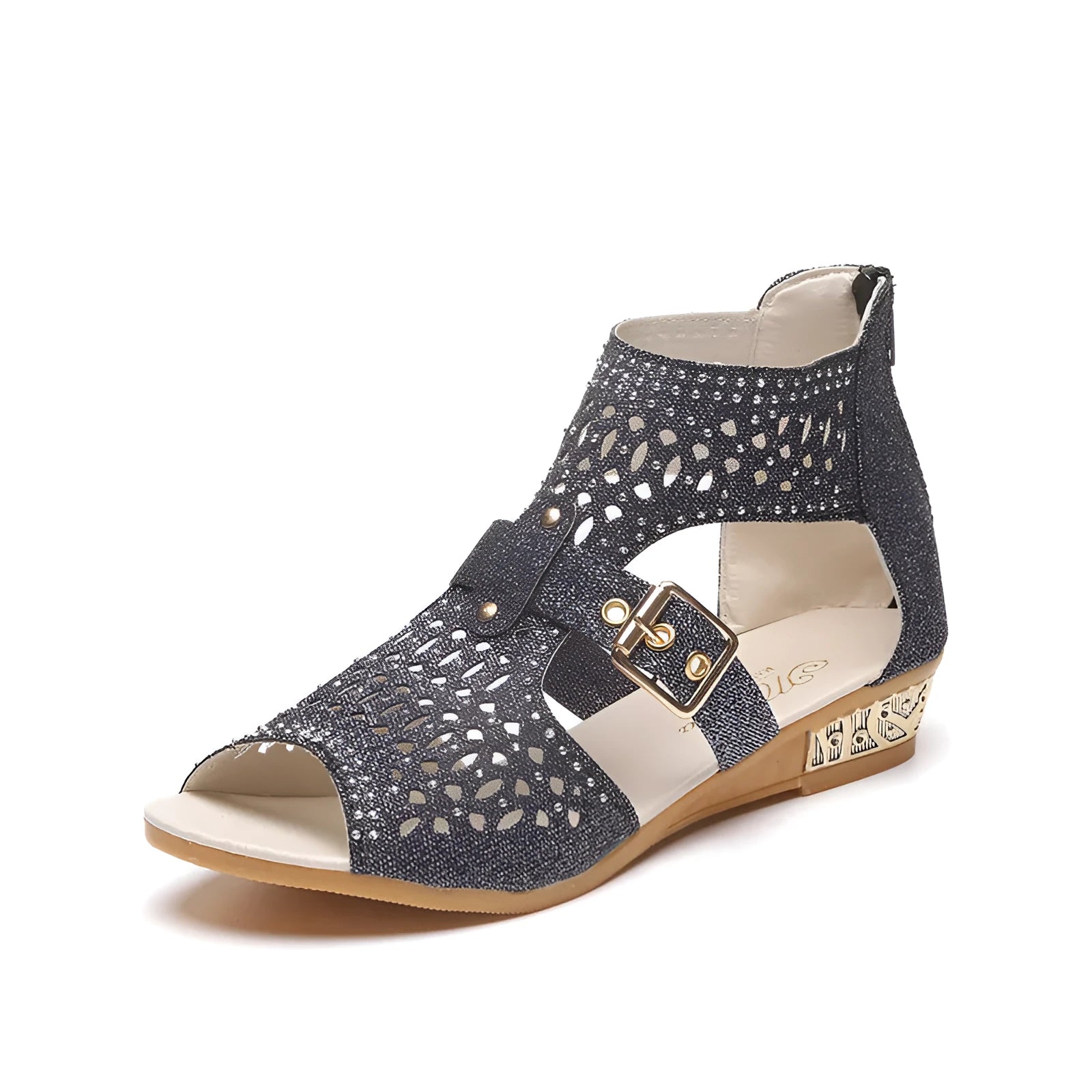 Women's beige rivet flat sandals showing fish mouth toe and back zipper closure on a wedge heel.