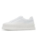 Women's black platform sneakers with back-lace fastening and thick rubber sole