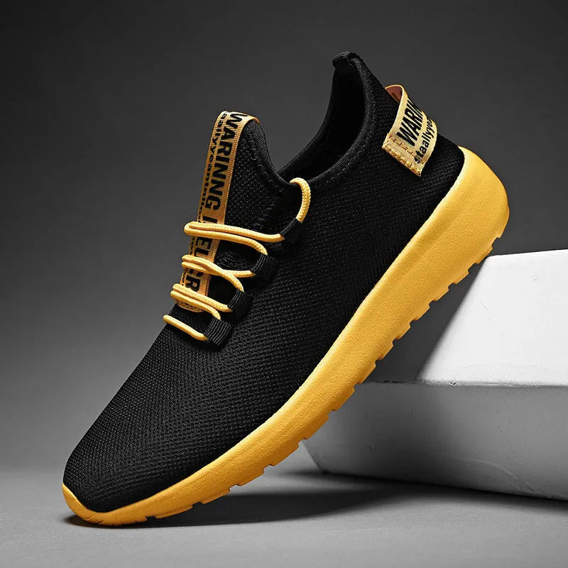 Men's breathable fly weave sports running shoes black and white colour side view