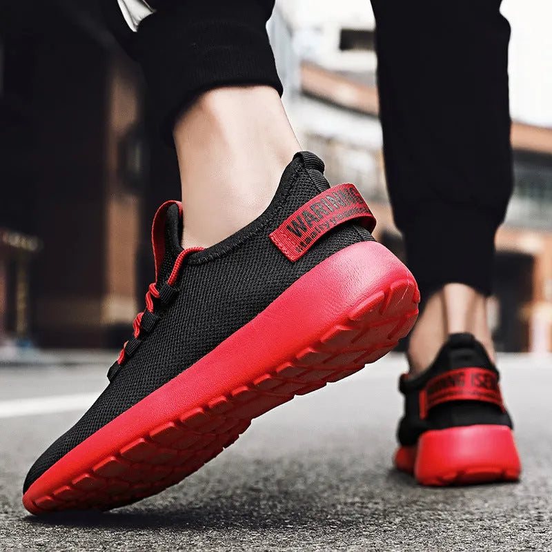 Men's breathable fly weave sports running shoes black and white colour side view
