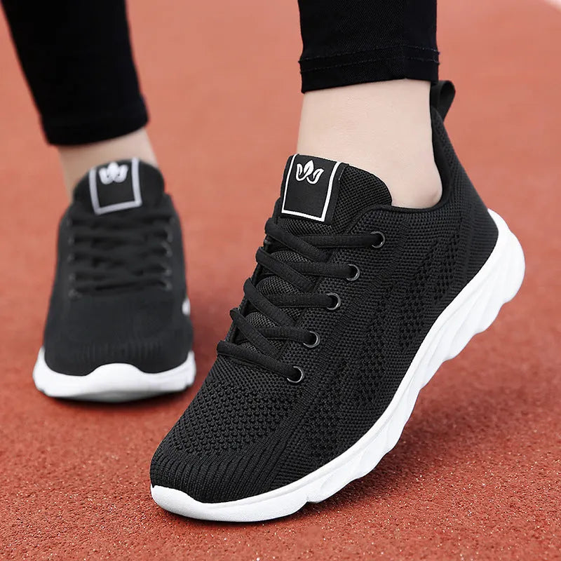 Women's black flat board high-top casual shoes with back lacing and sticky rubber sole