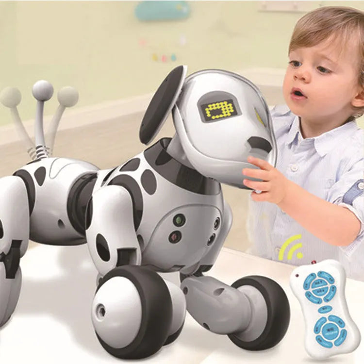 Smart robot dog electronic toy with remote control on a table.