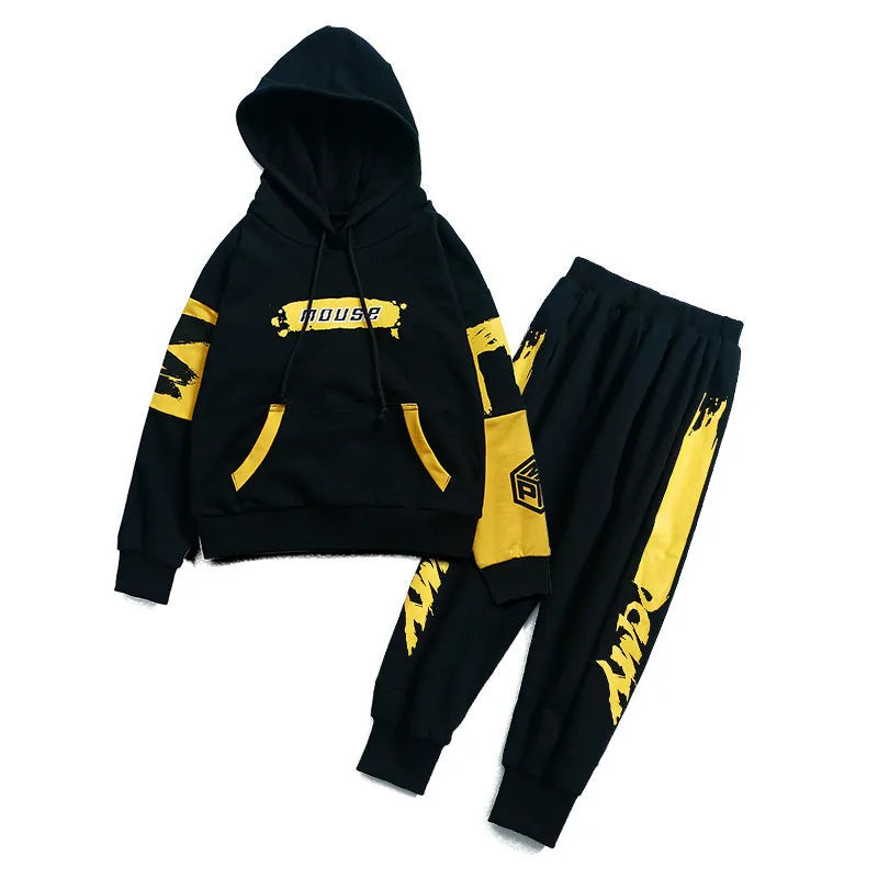 Boys yellow cotton hooded sports suit two-piece set with long sleeves and trousers.