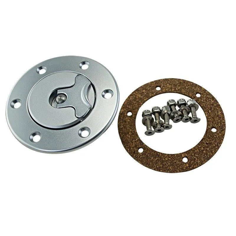Silver aluminium alloy universal car fuel tank cap on a white background