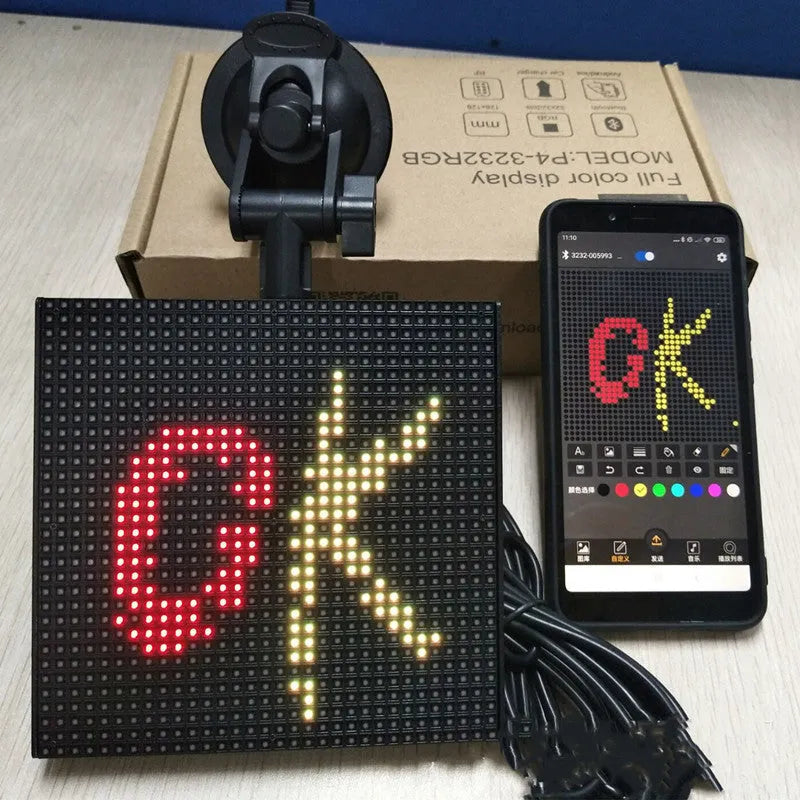 Full-colour 32x32 pixel Bluetooth car LED display showing a smiley face in horizontal scroll mode