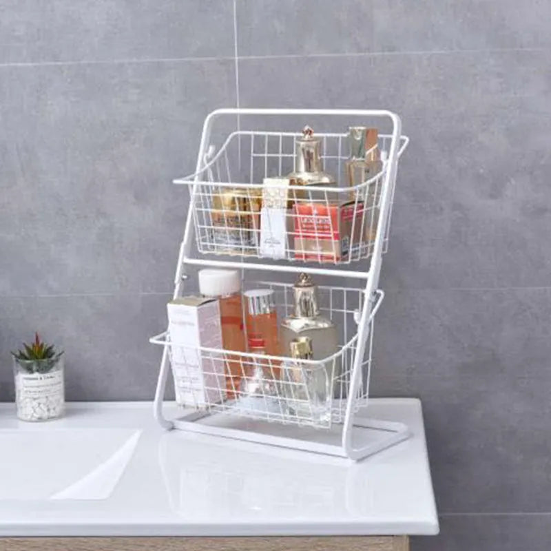 2-tier black iron kitchen storage rack with hollowed sides on countertop