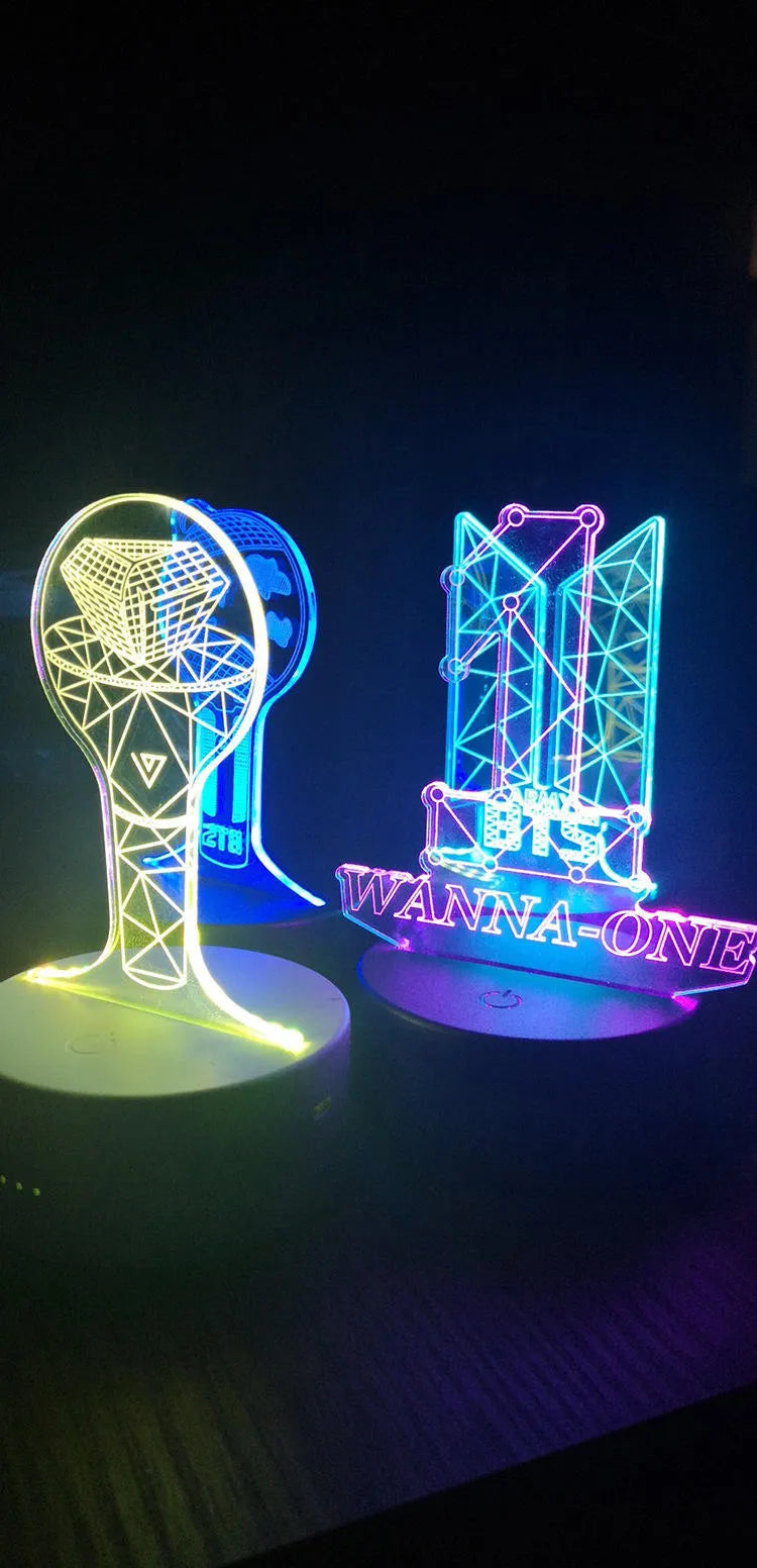 Clear acrylic display stand supporting 101 Tower Gem BTS lamp with universal voltage compatibility