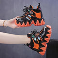 Women's inner height platform casual sports shoes with cross straps, artificial PU upper, grey colour option