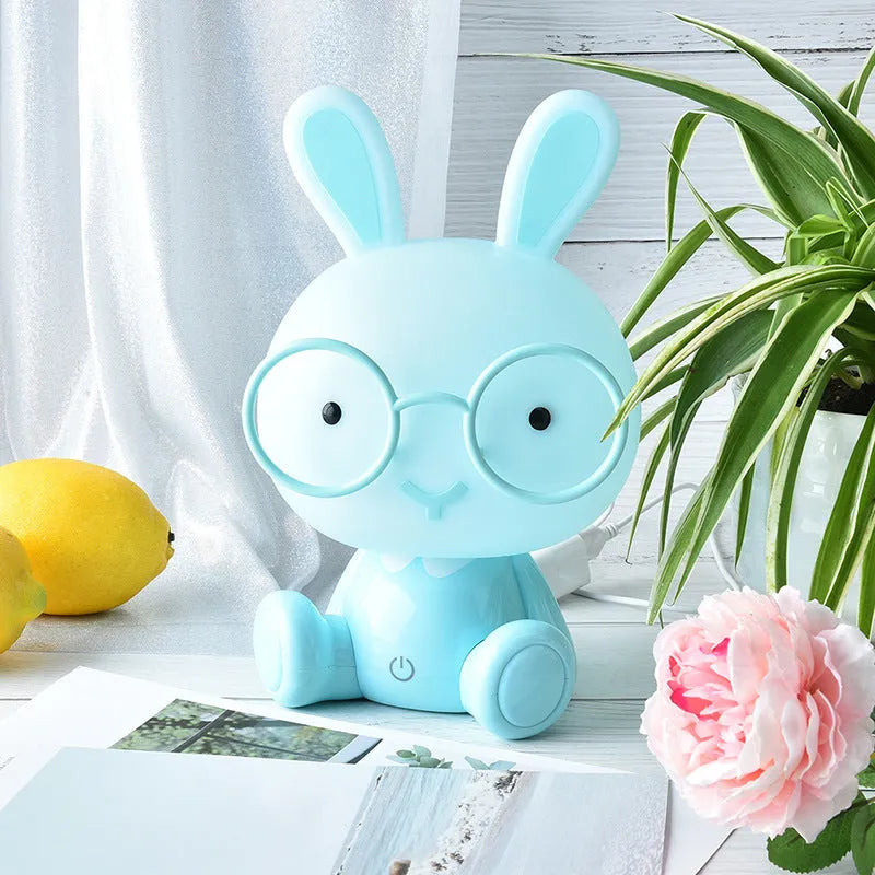 USB-powered cartoon rabbit night light with glasses in blue, green, or pink colour options