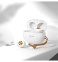 Pebble Series white wireless Bluetooth earbuds next to their compact charging case.