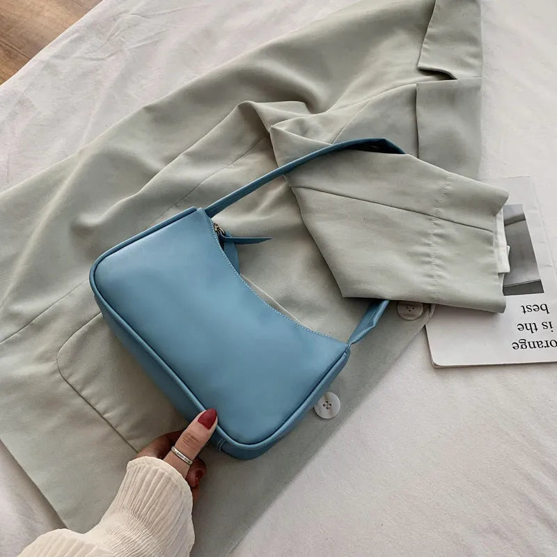 Women's one-shoulder armpit bag in soft PU, horizontal square shape, zip closure, available in 8 colours including white, black, pink, and khaki