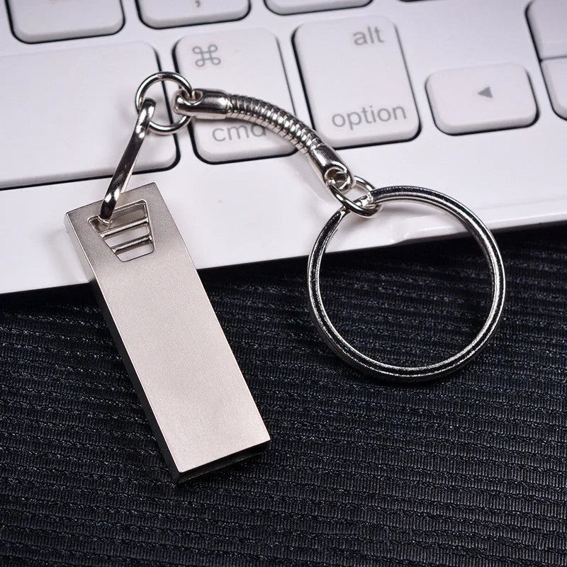 Customised creative metal USB flash drive in pink and silver colour options with compact design