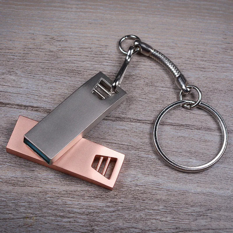 Customised creative metal USB flash drive in pink and silver colour options with compact design