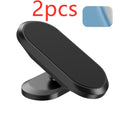 Black ABS 360-degree rotating magnetic car phone holder on dashboard with smartphone attached in portrait mode
