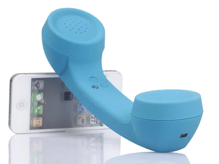 Retro-style Bluetooth wireless phone headset with coloured casing and two earbuds for hands-free calls.