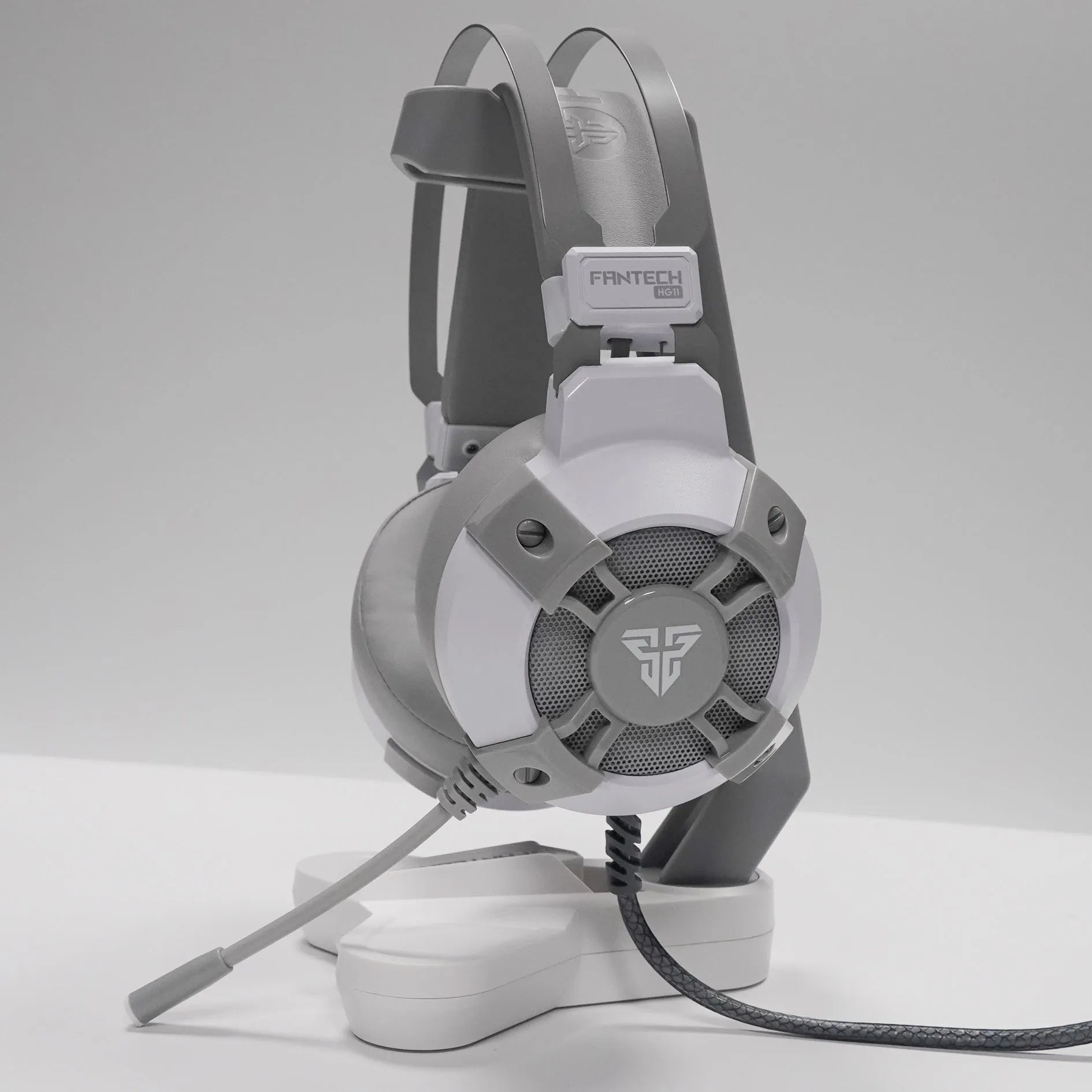Black FANTECH HG11 gaming headset with RGB lights and a USB cable