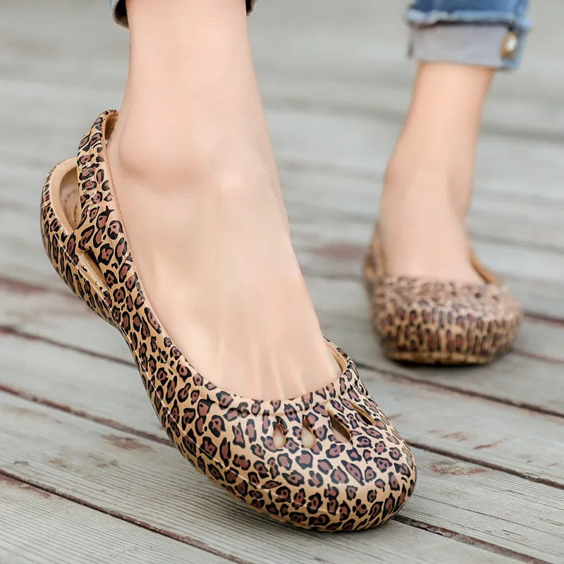 Ladies leopard pattern flat hole sandals with high elastic EVA rubber upper and sole in side view