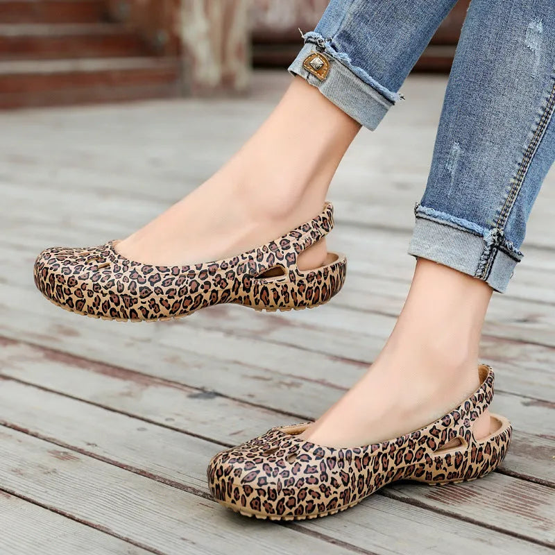 Ladies leopard pattern flat hole sandals with high elastic EVA rubber upper and sole in side view