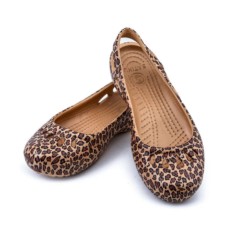 Ladies leopard pattern flat hole sandals with high elastic EVA rubber upper and sole in side view