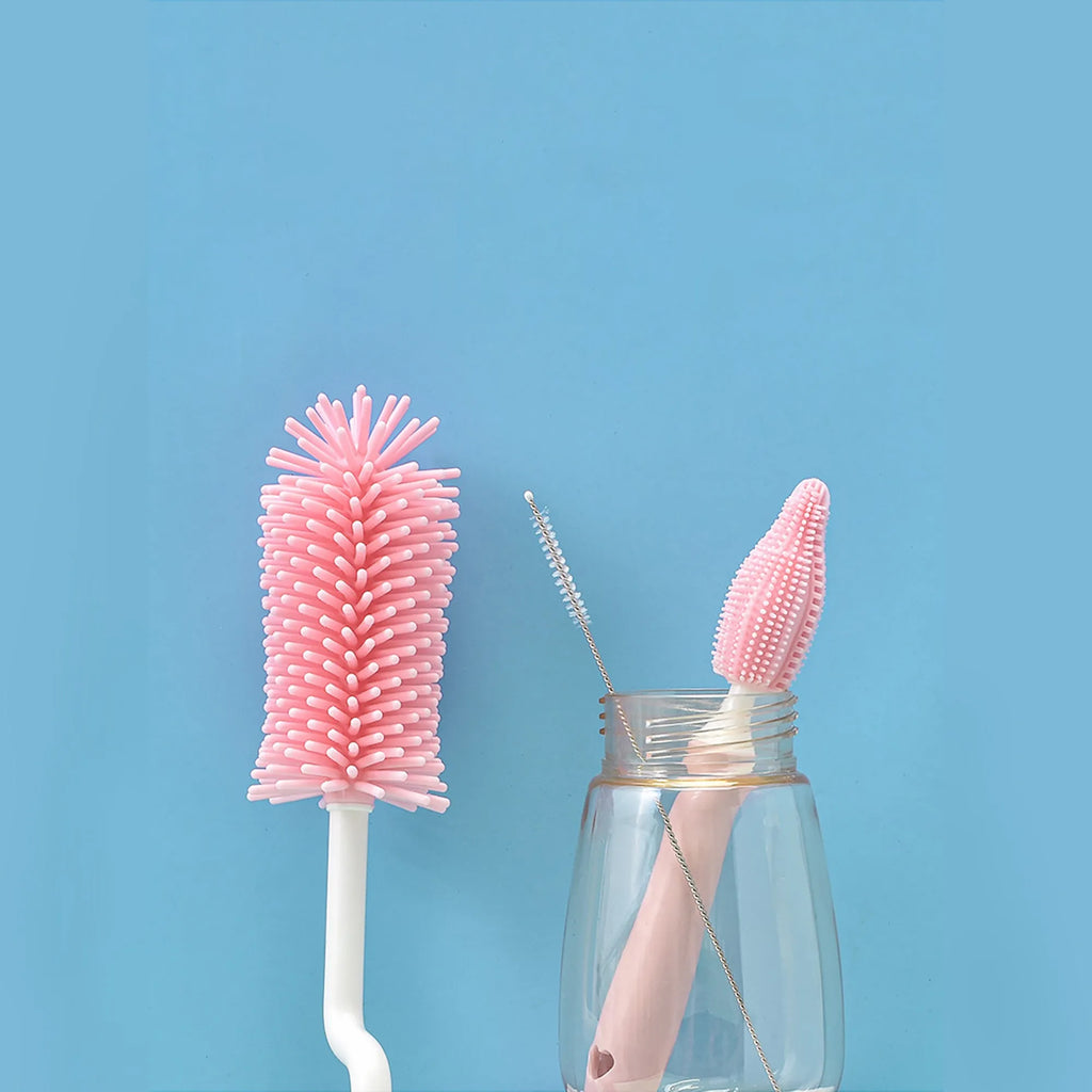 Silicone baby bottle brush cleaning set in blue, pink, and yellow colours