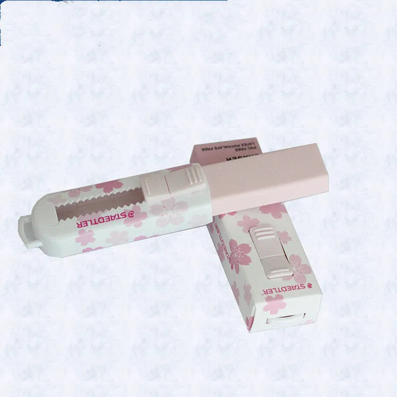 Pink square push-pull rubber wipe for whiteboards with replaceable core, 86mm long