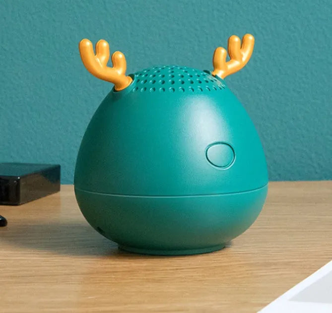 Compact portable Bluetooth speaker in white, pink or green with 75x88mm dimensions