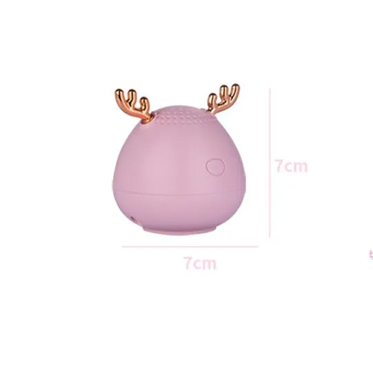 Compact portable Bluetooth speaker in white, pink or green with 75x88mm dimensions