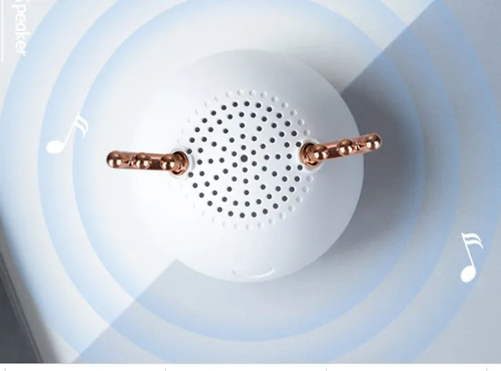 Compact portable Bluetooth speaker in white, pink or green with 75x88mm dimensions