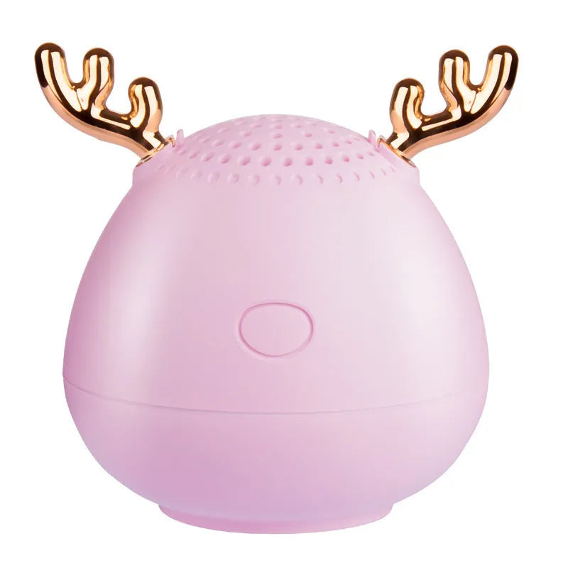 Compact portable Bluetooth speaker in white, pink or green with 75x88mm dimensions