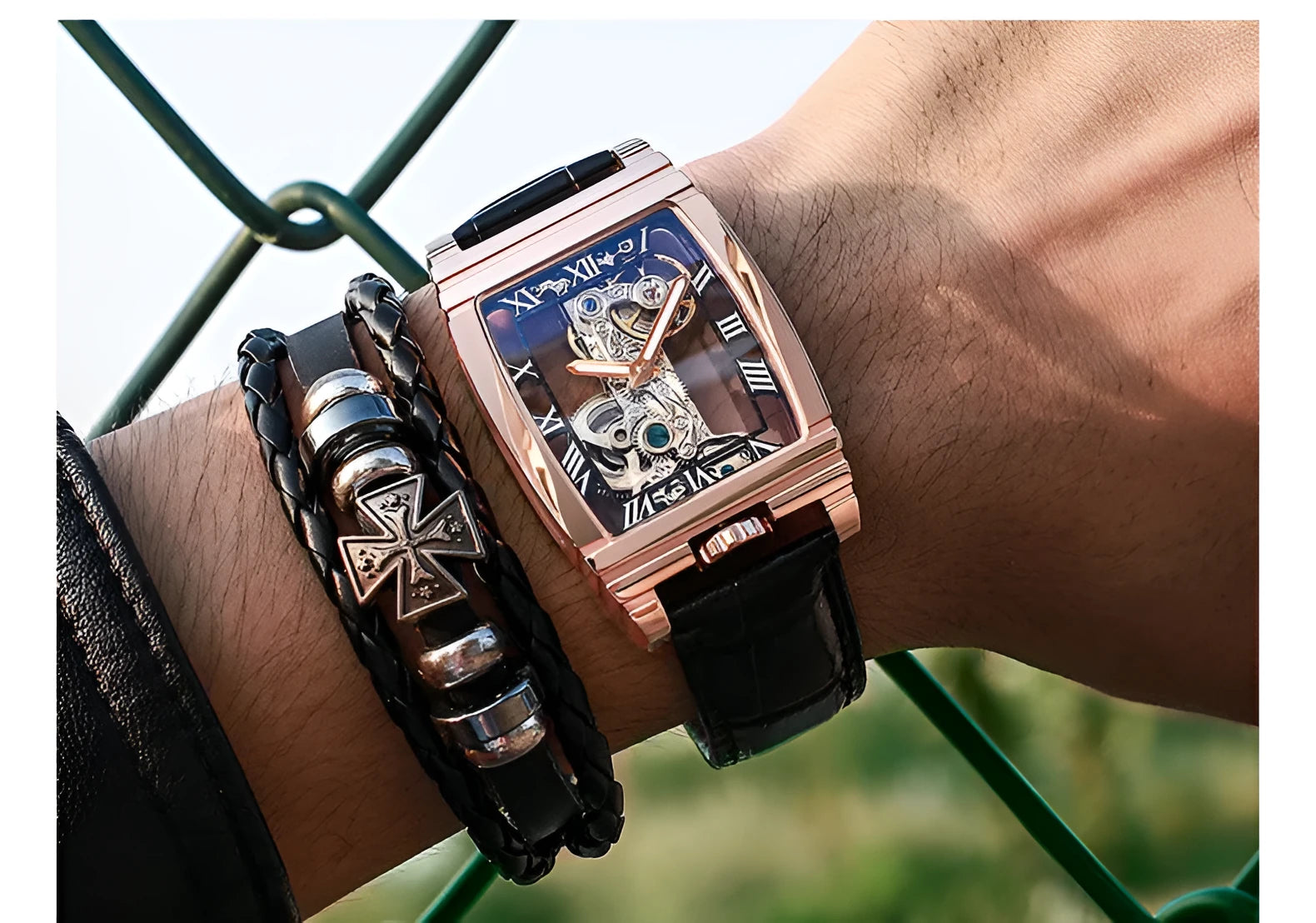 Daystar square stainless steel mechanical watch with black dial on a leather strap.