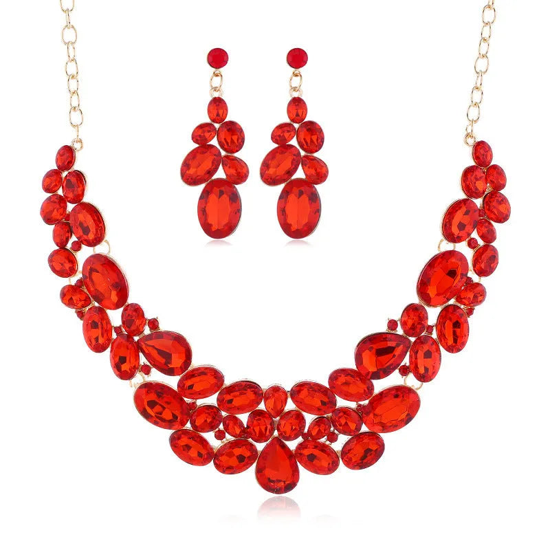 Women's alloy necklace earrings set with diamond finish, water wave chain, and flower pendant in artificial gems