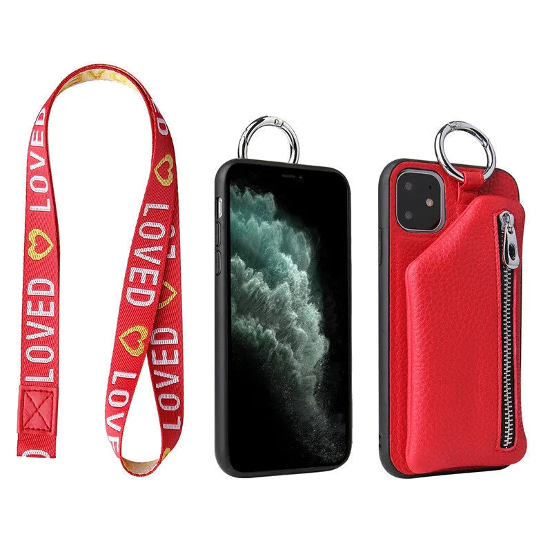 Pink imitation leather crossbody lanyard attached to a phone case on a table.