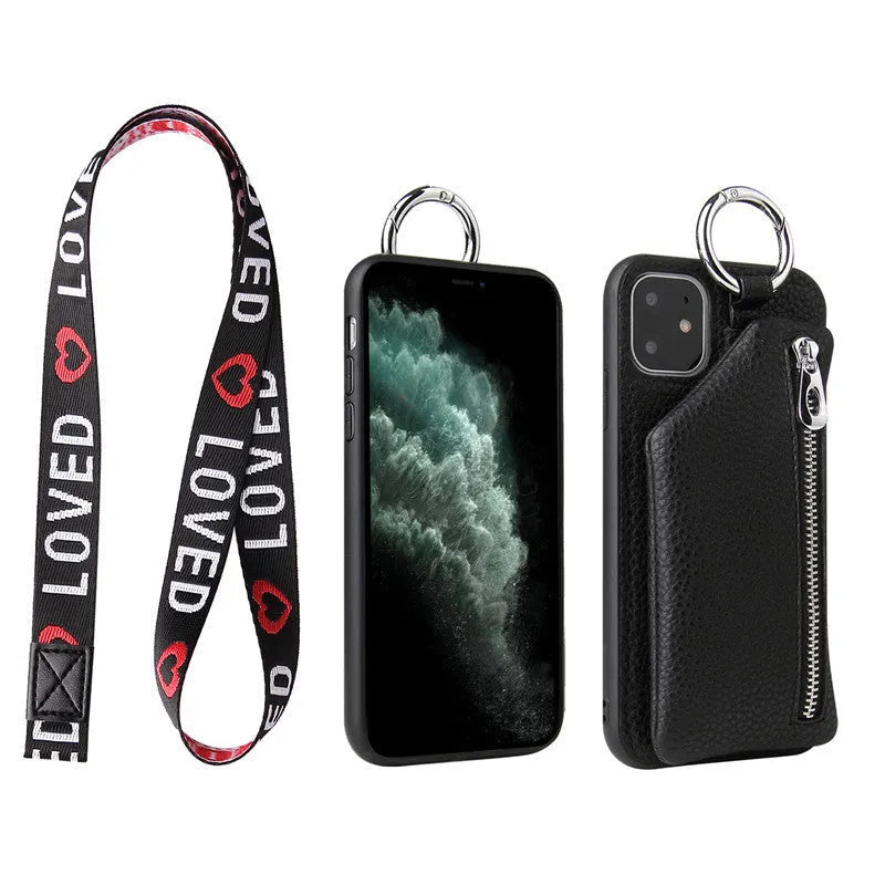 Pink imitation leather crossbody lanyard attached to a phone case on a table.
