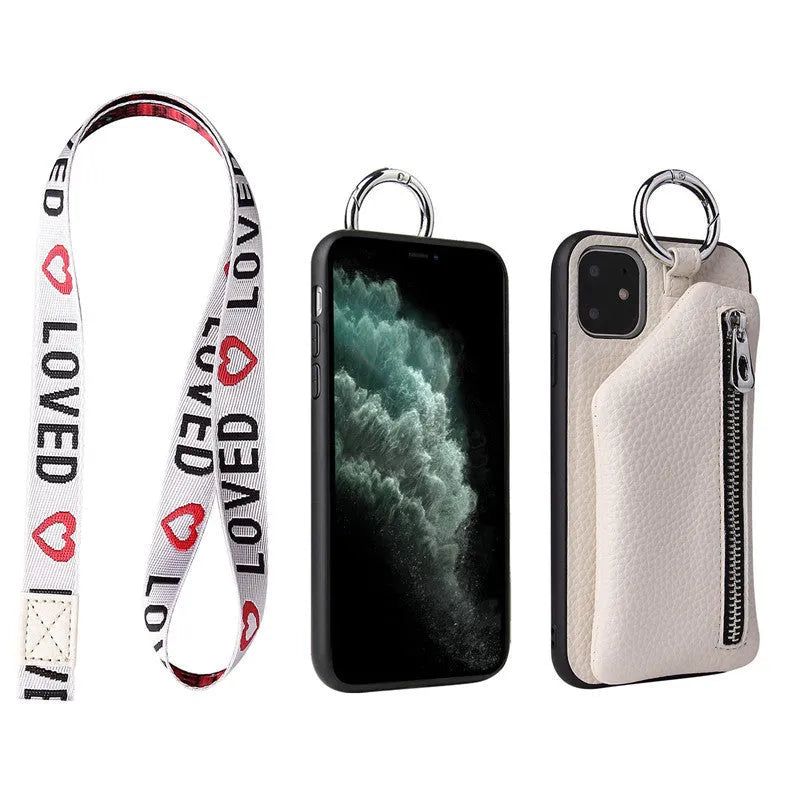Pink imitation leather crossbody lanyard attached to a phone case on a table.