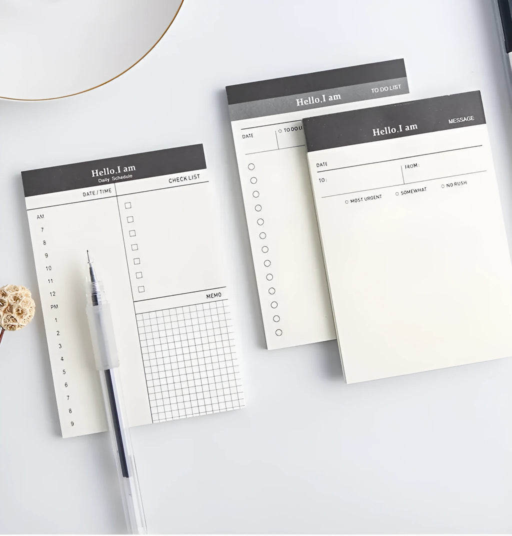 Business day planner notepad with paper cover, 52 inside pages and four cover options for desk use