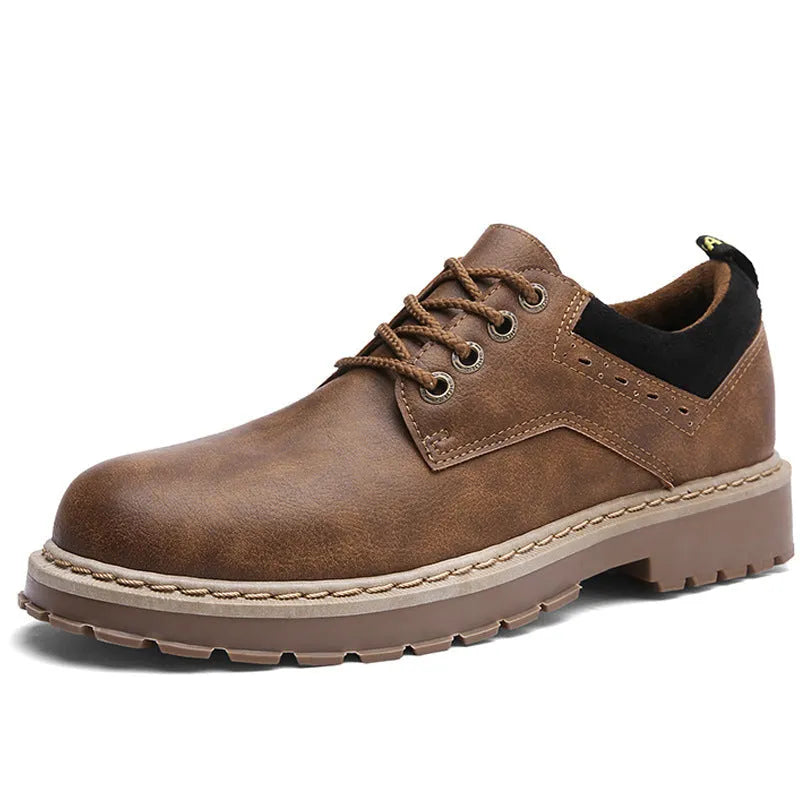 Men's black casual lace-up shoes with a round toe and low-top design on a rubber sole.