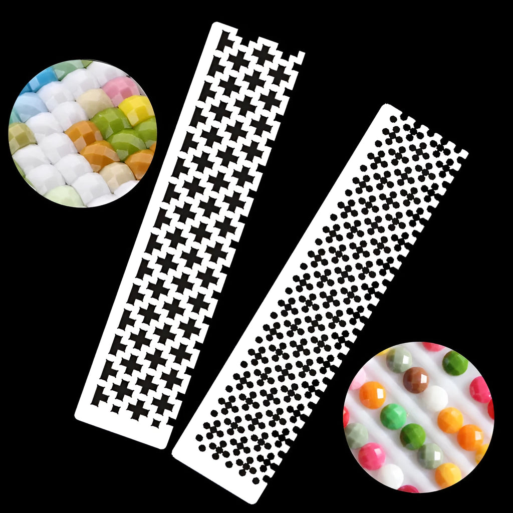 Stainless steel diamond painting grid ruler measuring 15cm by 3cm on a crafting table.