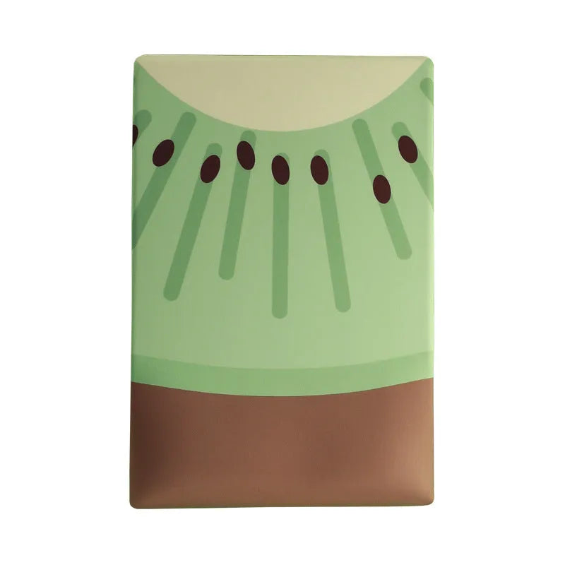 Green kiwi fruit themed mouse pad with integrated thick grey wrist support cushion on a desk.