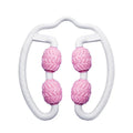Purple and pink silicone annular leg massage rollers for calf muscle recovery.